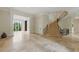 Expansive foyer with a curved staircase, tile flooring, and tall ceilings at 32602 Archdale, Chapel Hill, NC 27517