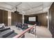 Basement home theater with tiered seating, projector, and professional sound system at 32602 Archdale, Chapel Hill, NC 27517