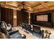 Luxurious home theater with black leather recliners, a large screen, and ambient lighting at 32602 Archdale, Chapel Hill, NC 27517