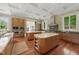 Gorgeous kitchen with double islands, stainless steel appliances, and custom cabinets at 32602 Archdale, Chapel Hill, NC 27517