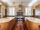 Gourmet kitchen with granite countertops, custom cabinetry, and stainless steel appliances, perfect for culinary enthusiasts at 32602 Archdale, Chapel Hill, NC 27517