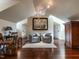 Relaxing living room with plush chairs, stylish decor, and warm, inviting lighting at 32602 Archdale, Chapel Hill, NC 27517