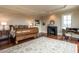 Inviting main bedroom boasts hardwood floors, a decorative fireplace, and plenty of space at 32602 Archdale, Chapel Hill, NC 27517