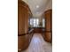 Butler's pantry with custom wood cabinetry and black countertops at 32602 Archdale, Chapel Hill, NC 27517
