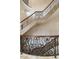 Beautiful staircase featuring decorative iron railings and wood banister, adding architectural detail at 32602 Archdale, Chapel Hill, NC 27517