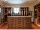 Custom walk-in closet with built-in drawers and ample storage, perfect for organizing a wardrobe and accessories at 32602 Archdale, Chapel Hill, NC 27517