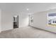 Bedroom with gray carpet and view of neighborhood at 336 Arch Cyn Cir, Zebulon, NC 27597