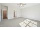 Spacious bedroom with a view into an adjoined bathroom at 35 Hewitt Wds Dr, Clayton, NC 27527