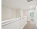 Hallway on second floor featuring neutral walls and carpeted floors at 35 Hewitt Wds Dr, Clayton, NC 27527