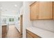 This modern kitchen features stainless appliances, white backsplash, an island, and plenty of cabinet space at 35 Hewitt Wds Dr, Clayton, NC 27527