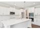 This kitchen features an expansive island, stainless appliances, and lots of cabinet space at 35 Hewitt Wds Dr, Clayton, NC 27527