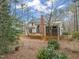 Two-story house with deck and screened porch in wooded setting at 4 Governors Pl, Durham, NC 27705