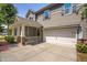 Two-story house with porch and garage at 4052 Truelove Dr, Apex, NC 27539