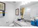 Well-lit bathroom with granite countertop, single sink, and stylish decor at 435 Rowe Way, Knightdale, NC 27545