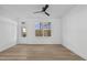 Spacious living room with hardwood floors and a ceiling fan at 4811 Gossamer Ln # 103, Raleigh, NC 27616