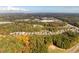 Aerial view of houses and surrounding landscape at 4860 Fayetteville Rd, Durham, NC 27713