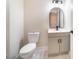 Modern bathroom with gray vanity and marble floors at 4860 Fayetteville Rd, Durham, NC 27713