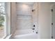 Elegant bathroom with marble tile shower and bathtub at 4860 Fayetteville Rd, Durham, NC 27713