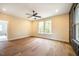 Spacious bedroom with hardwood floors and large windows at 4860 Fayetteville Rd, Durham, NC 27713