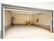 Attached garage with Tesla charger and extra storage at 4860 Fayetteville Rd, Durham, NC 27713