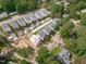 Aerial shot displaying new construction homes with driveways and neatly arranged yards in a development at 5041 Lundy Dr # 101, Raleigh, NC 27606