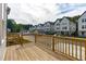 Back deck overlooks townhomes and a paved parking area at 5041 Lundy Dr # 101, Raleigh, NC 27606