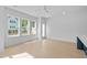 Bright dining area with hardwood floors and access to a back deck at 5041 Lundy Dr # 101, Raleigh, NC 27606