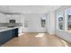 Bright dining area with hardwood floors and access to a back deck at 5041 Lundy Dr # 101, Raleigh, NC 27606