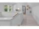 Hallway with stairs and entry to the bathroom at 5041 Lundy Dr # 101, Raleigh, NC 27606