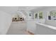 Light-filled living room featuring vaulted ceilings and neutral colored decor at 5041 Lundy Dr # 101, Raleigh, NC 27606