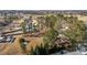 Aerial view of several homes in a rural location with bare trees and winter ground cover at 5088 Christian Light Rd, Fuquay Varina, NC 27526