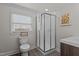 Clean bathroom with a shower stall and wood-look floors at 5088 Christian Light Rd, Fuquay Varina, NC 27526
