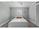 Cozy bedroom with hardwood floors and ceiling fan at 5088 Christian Light Rd, Fuquay Varina, NC 27526