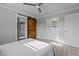 Bedroom with built-in dresser and barn door at 5088 Christian Light Rd, Fuquay Varina, NC 27526