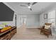 Living room with hardwood floors and a view down a hallway at 5088 Christian Light Rd, Fuquay Varina, NC 27526