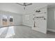 Spacious living room with fireplace and French doors at 5088 Christian Light Rd, Fuquay Varina, NC 27526