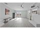 Spacious living area featuring a fireplace and wood flooring at 5088 Christian Light Rd, Fuquay Varina, NC 27526