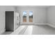 Interior room view with a large safe and french doors leading to a yard at 5088 Christian Light Rd, Fuquay Varina, NC 27526
