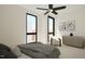 Bright bedroom with large windows, neutral decor, and modern furnishings at 512 Gordon Street # 303, Durham, NC 27701