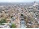 Aerial view of neighborhood with tree-lined streets and homes at 517 N East St, Raleigh, NC 27604