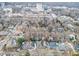 Wide aerial view showing the home and surrounding neighborhood at 517 N East St, Raleigh, NC 27604