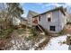 Home's backyard with stone pathway, deck, and a charming view at 517 N East St, Raleigh, NC 27604