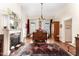 Large bedroom with hardwood floors, fireplace, and antique furniture at 517 N East St, Raleigh, NC 27604