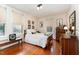 Bright bedroom with hardwood floors and ample closet space at 517 N East St, Raleigh, NC 27604