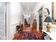Long hallway with hardwood floors and unique wall decor at 517 N East St, Raleigh, NC 27604
