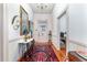 Bright hallway with hardwood floors and access to multiple rooms at 517 N East St, Raleigh, NC 27604