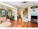 Open living area with hardwood floors, and view of the stairs at 517 N East St, Raleigh, NC 27604