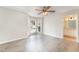 Bright bedroom with bay window, ceiling fan, and hardwood floors at 5504 Ocracoke Ct, Raleigh, NC 27610