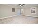 Spacious bedroom with neutral walls and carpeting at 704 Misty Isle Pl, Raleigh, NC 27615