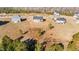Aerial view of a new construction home with a deck, surrounded by a spacious yard at 75 Brookhaven Dr, Spring Hope, NC 27882